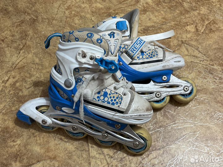 Роликовые коньки