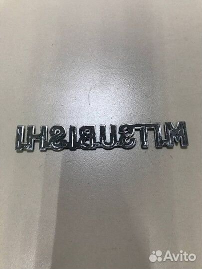 Эмблема на крышку багажника м и т с у б и с и