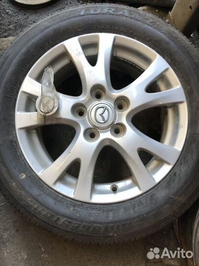 Диск литой mazda R16