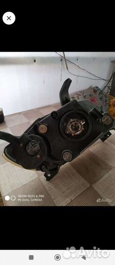 Фара Mazda Demio L