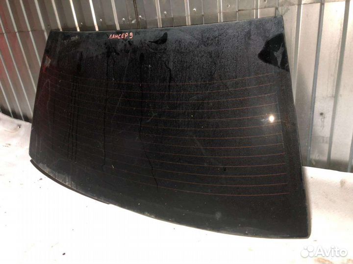 Заднее ветровое стекло Mitsubishi lanser 9