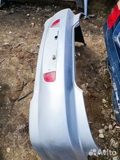 Бампер задний Kia Spectra