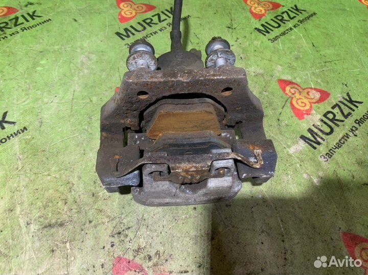 Суппорт тормозной задний левый Bmw X5 E70 M57D30T2