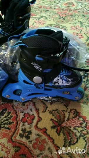 Роликовые коньки