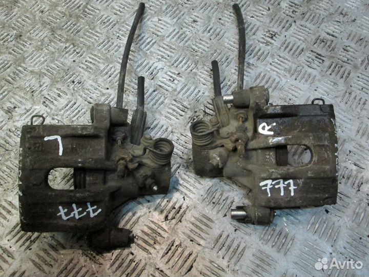 Суппорт тормозной задний для Мазда 3 бк бл