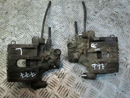 Суппорт тормозной задний для Мазда 3 бк бл