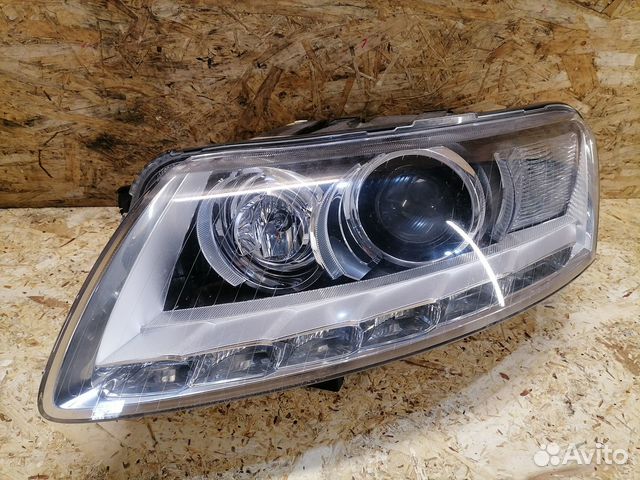 Фара ксенон левая Audi A6 C6 Rest