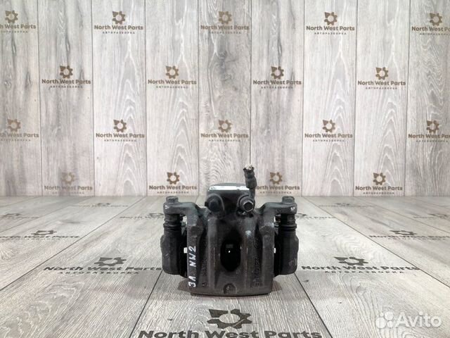 Суппорт задний левый Kia Sorento 2 внедорожник