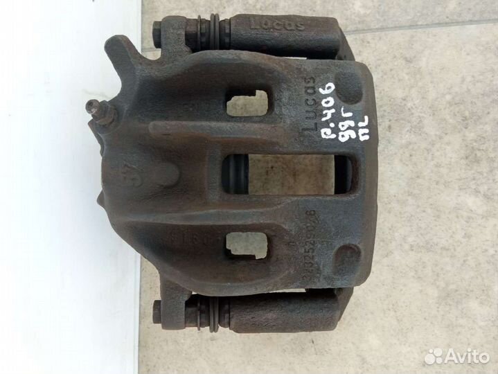 Суппорт тормозной передний левый Peugeot 406