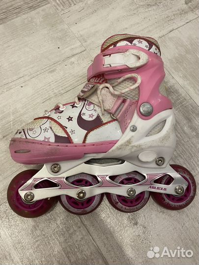 Роликовые коньки