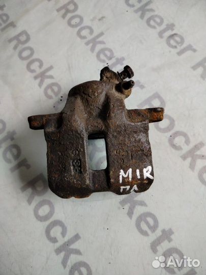 Суппорт тормозной передний левый Mitsubishi Mirage