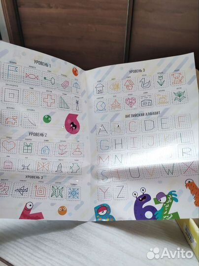 Игрушка Развивающий геоборд с резинками