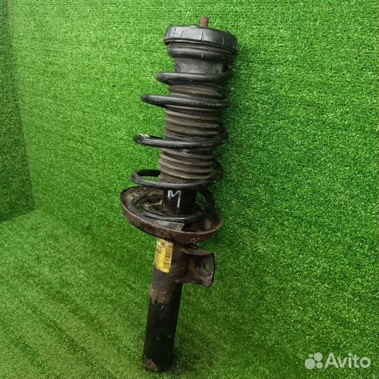 Стойка амортизатора передняя правая Opel 13368263