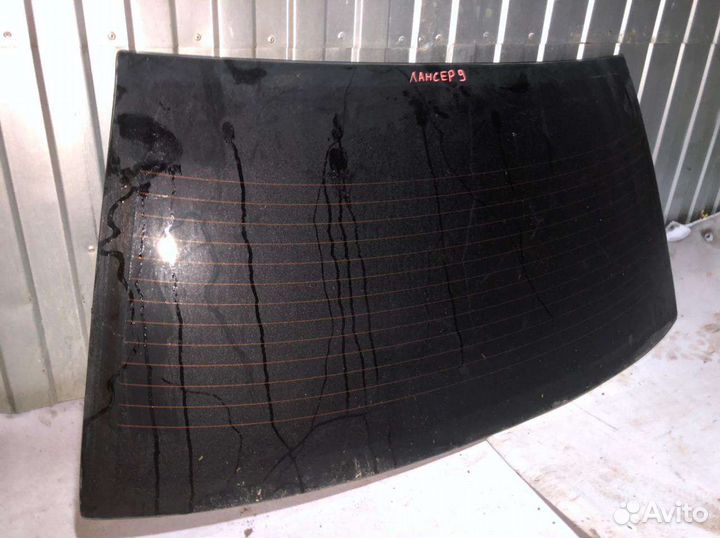 Заднее ветровое стекло Mitsubishi lanser 9