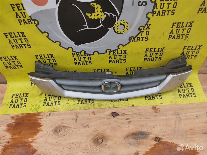 Решетка радиатора Mazda Demio (dw3w) 1996-2002