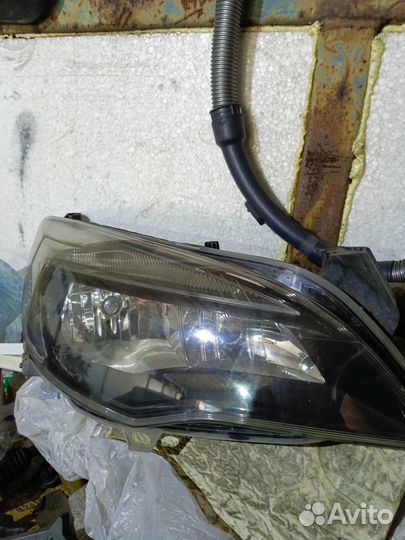 Фара Опель астра j