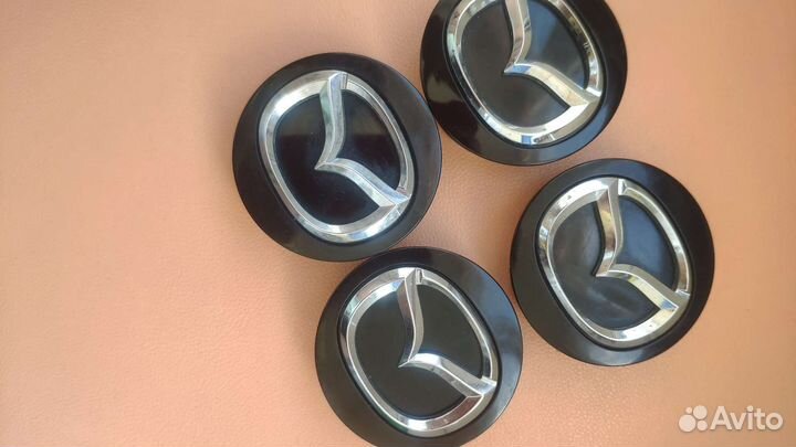 Колпачки на диски mazda оригинал