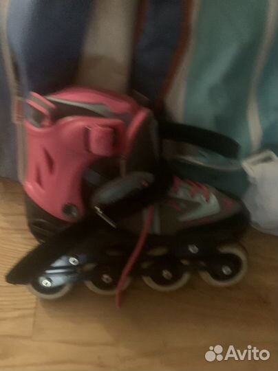 Роликовые коньки