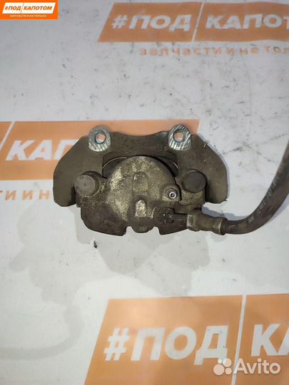 Суппорт тормозной передний левый Ford Focus