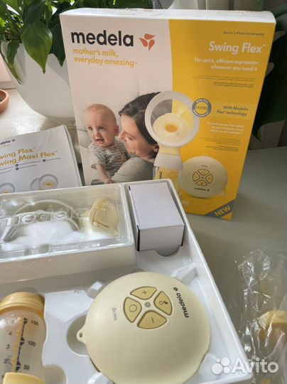 Молокоотсос medela swing flex электрический
