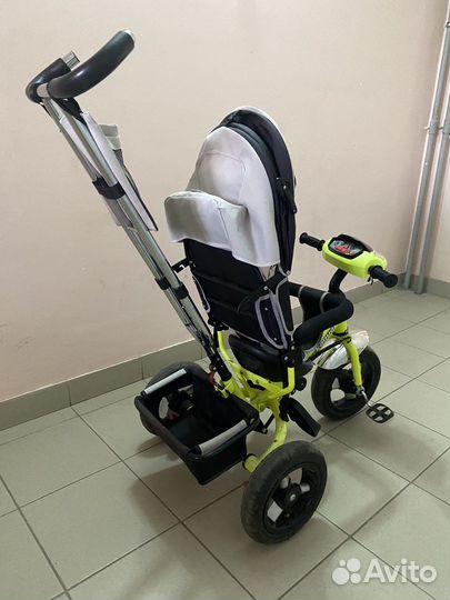 Трехколесный велосипед с ручкой