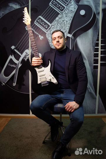 Уроки игры на гитаре в студии на Западном