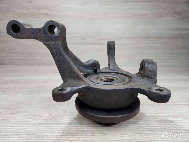 Кулак поворотный правый Renault Laguna 1