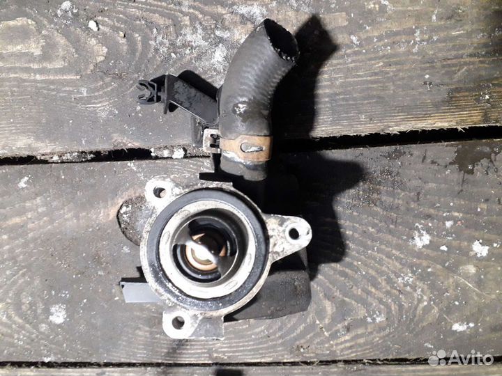 Корпус термостата Рено Логан 2