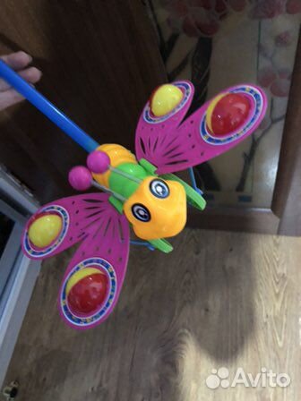 Игрушка каталка бабочка