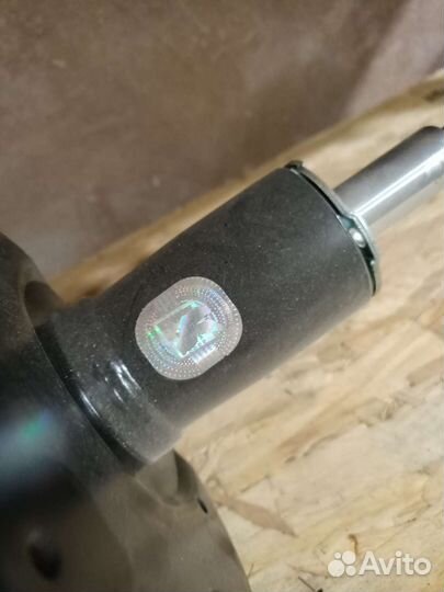 Стойка амортизатора передняя правая LADA Kalina 1