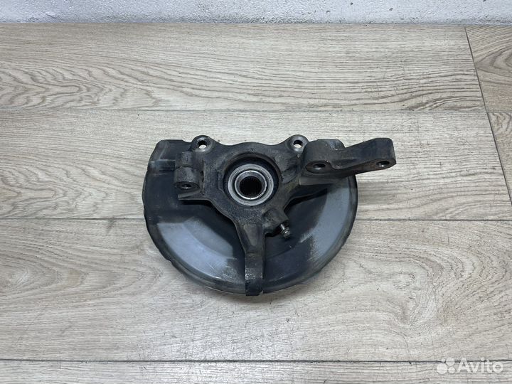 Кулак правый передний Mitsubishi Lancer 10