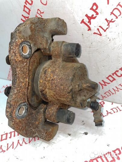 Суппорт тормозной передний правый Mazda Premacy CW