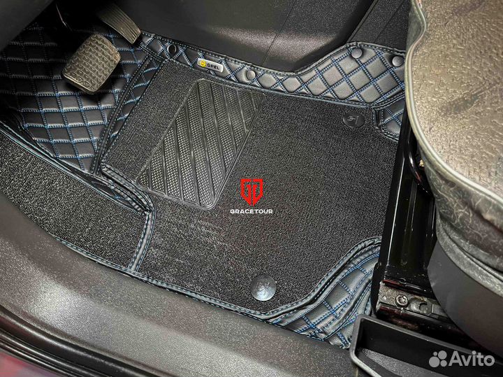 Автоковрики в багаж Opel Zafira