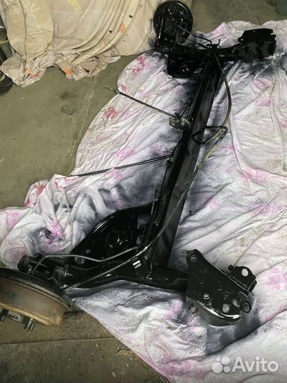 Продам заднюю балку Nissan March k12