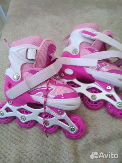 Роликовые коньки