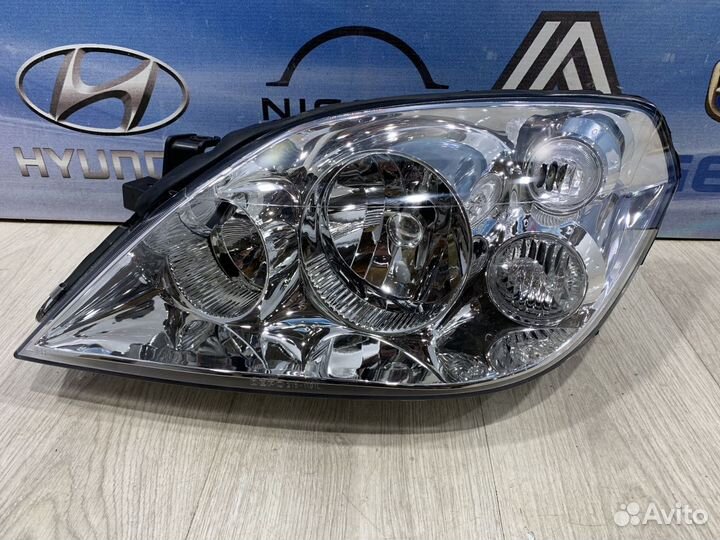 Фара Nissan primera P12 Лев