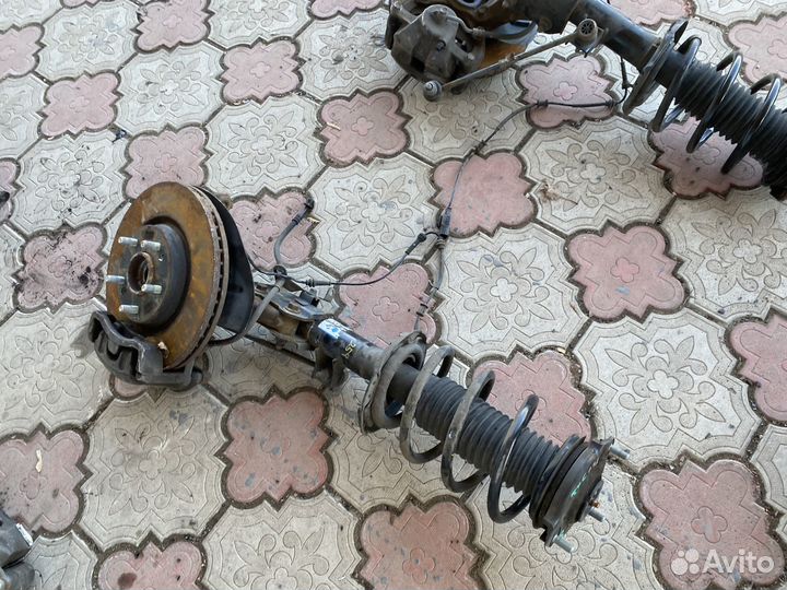 Стойка амортизатора передняя Hyundai Tucson 3