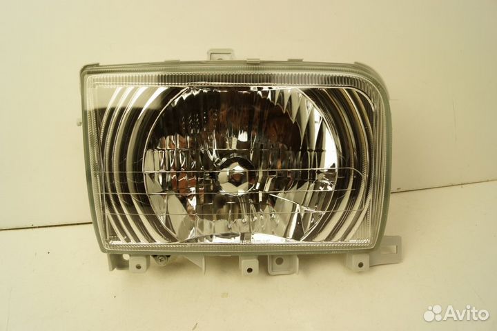 Фара nissan atlas 1992-2007 хрусталь