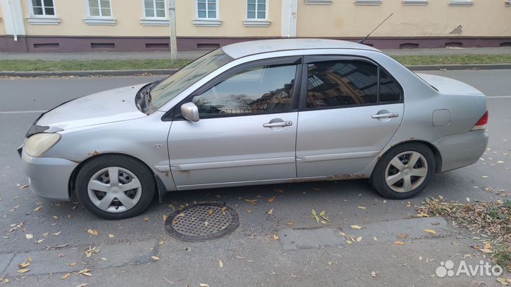 Mitsubishi Lancer 1.6 МТ, 2005, 307 220 км