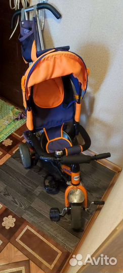 Трехколесный велосипед с родительской ручкой