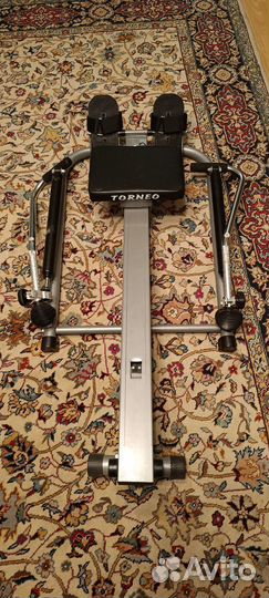 Гребной тренажер