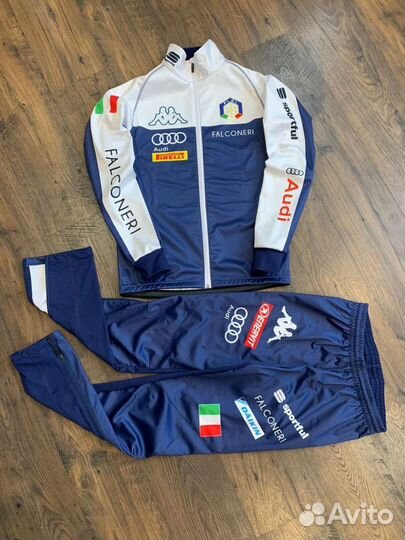 Разминочные костюмы и жилеты