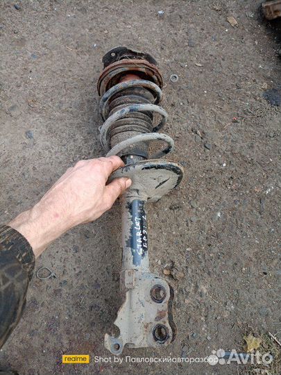 Амортизатор стойка передний левый Toyota Starlet