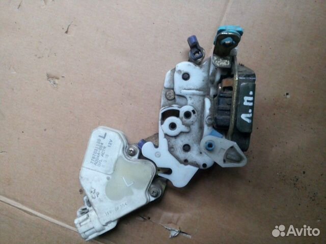 Замок двери передней левой Almera Classic B10