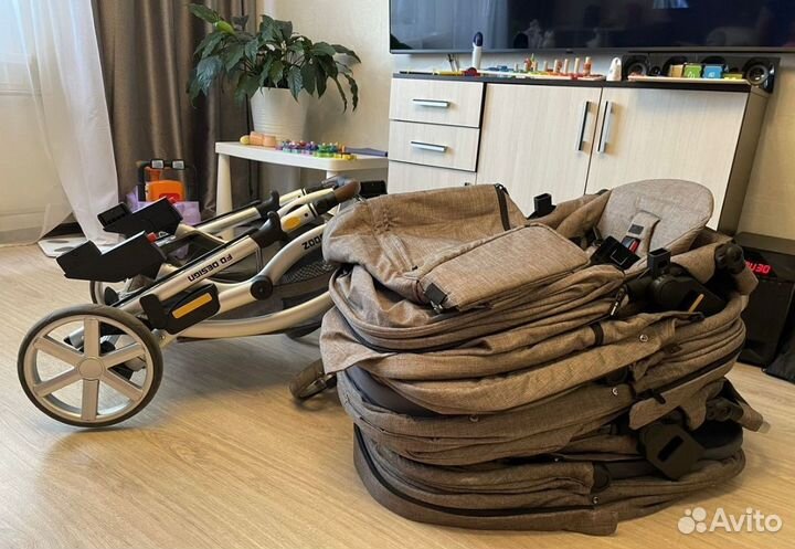 Двухместная коляска