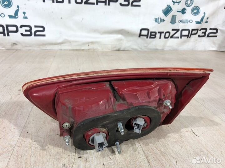 Фонарь крышки багажника левый Mitsubishi Lancer 10