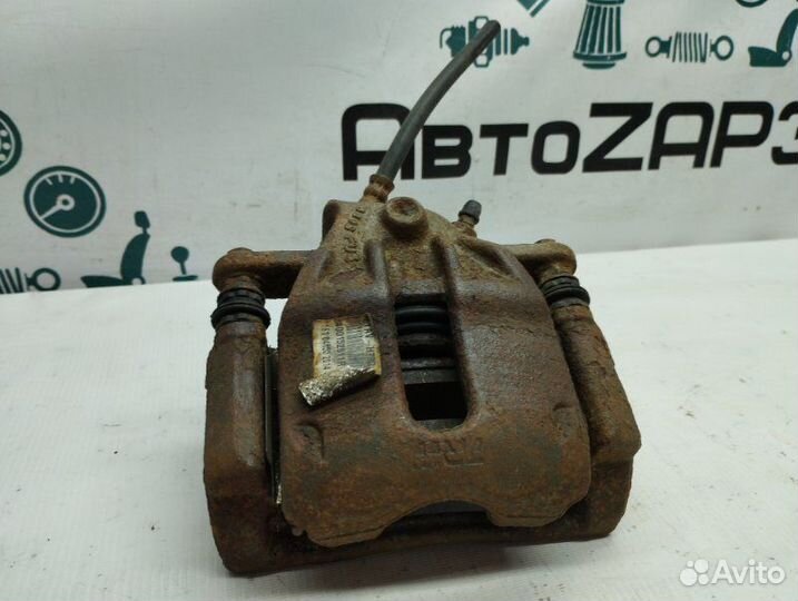 Суппорт тормозной передний левый Renault Duster