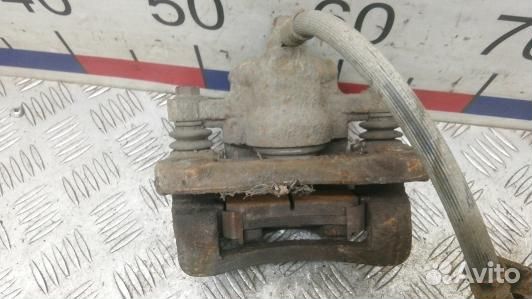 Суппорт тормозной задний правый KIA RIO 2 (EDN17OO