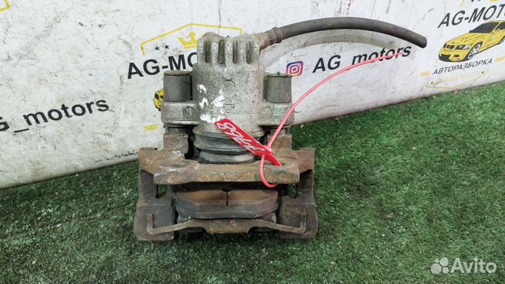 Суппорт тормозной задний левый BMW E39