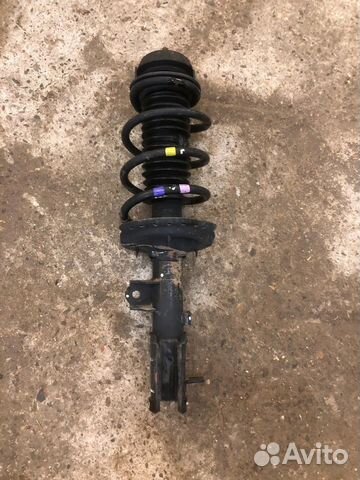 Стойка амортизатора передняя левая Hyundai Solaris